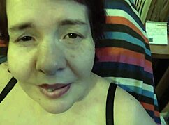 This mature beauty with huge tits caresses herself slowly, building up her sexy solo pleasure.