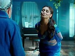 Rani Mukharji slips out of her saree, flashing panty glimpses and curvy ass cheeks in tight view.