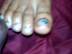 Ebony Delivers Steamy Foot Job Cumshot