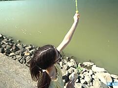 Bathtub bubbles surround Sara Bell and Raul Costa relaxing together