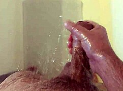 she strokes her wet body in the shower till orgasm hits