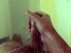 she strokes her wet body in the shower till orgasm hits