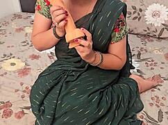 Watch sexy Indian Vasna Bhabhi fuck her pussy with huge 10-inch dildo!