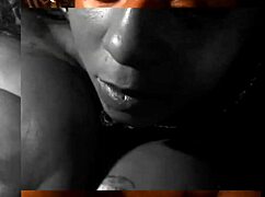 oiled black amateurs grind huge bbc between slick tits to thumping music beats in homemade titfuck video that pulses with raw energy