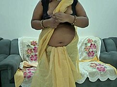 desi saree aunty lifts fabric to flash her full tits teasingly