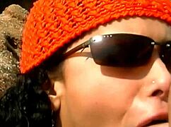 A mature guy pounds exotic babe's pussy cowgirl on seaside rocks licking her clit