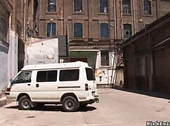 Bound blonde slut in latex endures bizarre outdoor bondage domination fuck.