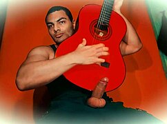 check this sexy bodybuilder stroking his huge 18cm cock guitar-style till he cums