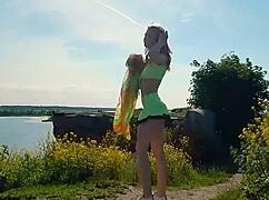 SPUNKY BLONDE TEEN MODEL STRIPS NAKED OUTDOORS IN MINISKIRT