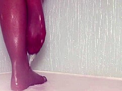 Nylon feet tease wet in steamy shower play