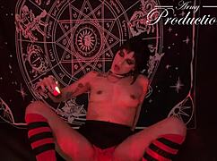 gothic girl performs intimate ritual with boyfriend in shadows