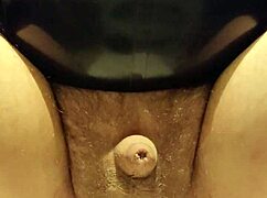 latexi69 slips buttplug deep into her latex-clad ass for intense anal play session